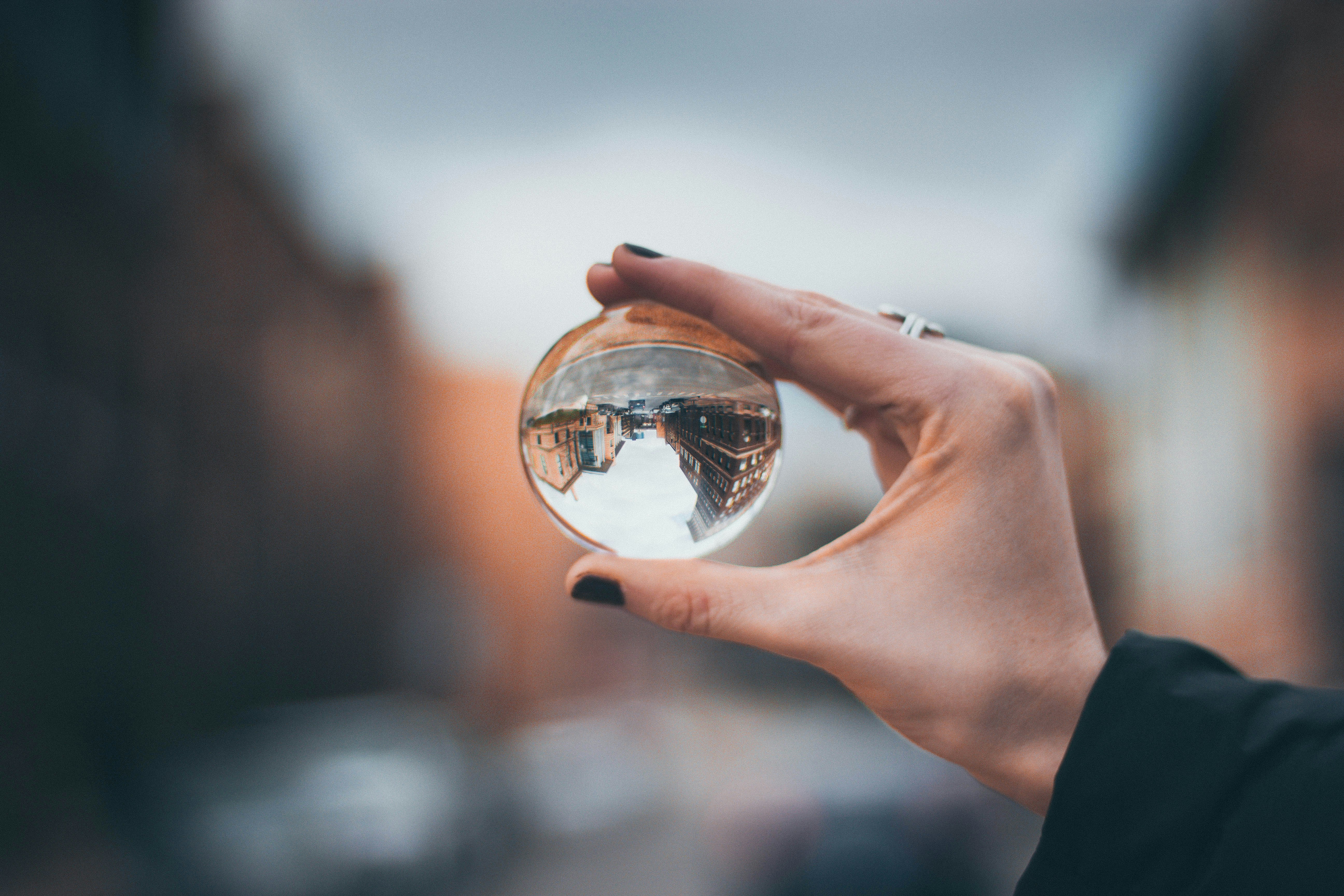 A world reflected in a crystal ball, symbolizing multiple perspectives
